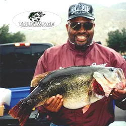 Ray Caldwell holding a bass fish