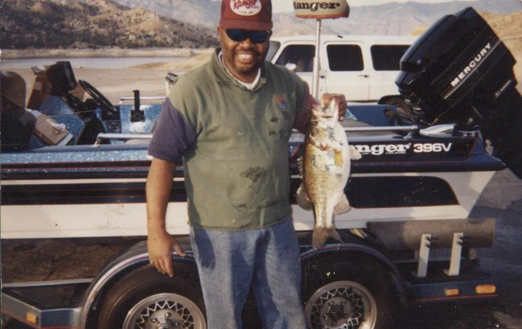 Ray Caldwell catching a bass fish at Lake Isabella